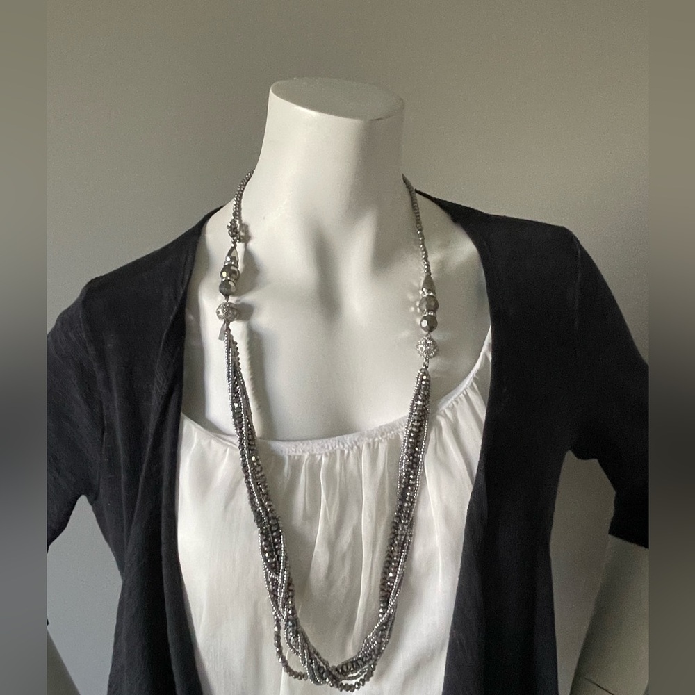 Magnetic clasp dual multi strand jeweled necklace.  Silver tone.